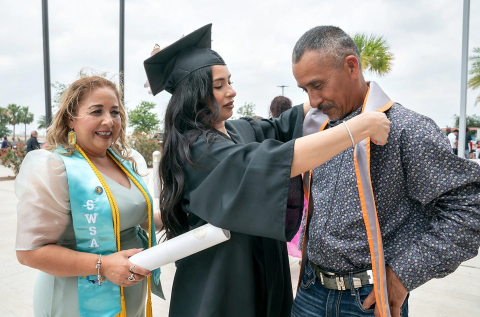 UTRGV graduate with family