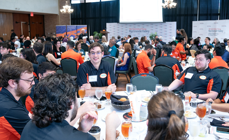 UTRGV students sitting at reception