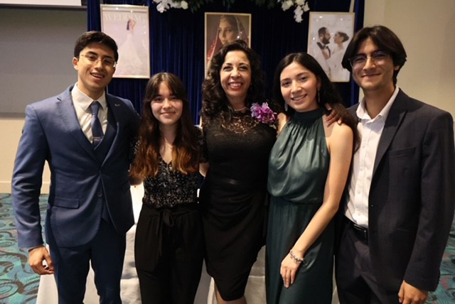 Maria Leonard, an assistant professor of practice of Management with the UTRGV Robert C. Vackar College of Business and Entrepreneurship, was selected by the Rio Grande Valley Hispanic Chamber of Commerce for its annual Women of Distinction recognition. A few UTRGV students showed their support for the professor when she accepted her award at the RGV Hispanic Chamber’s Hats Off to Women of Distinction Dinner and Expo 2023. (Courtesy Photo: Maria Leonard)