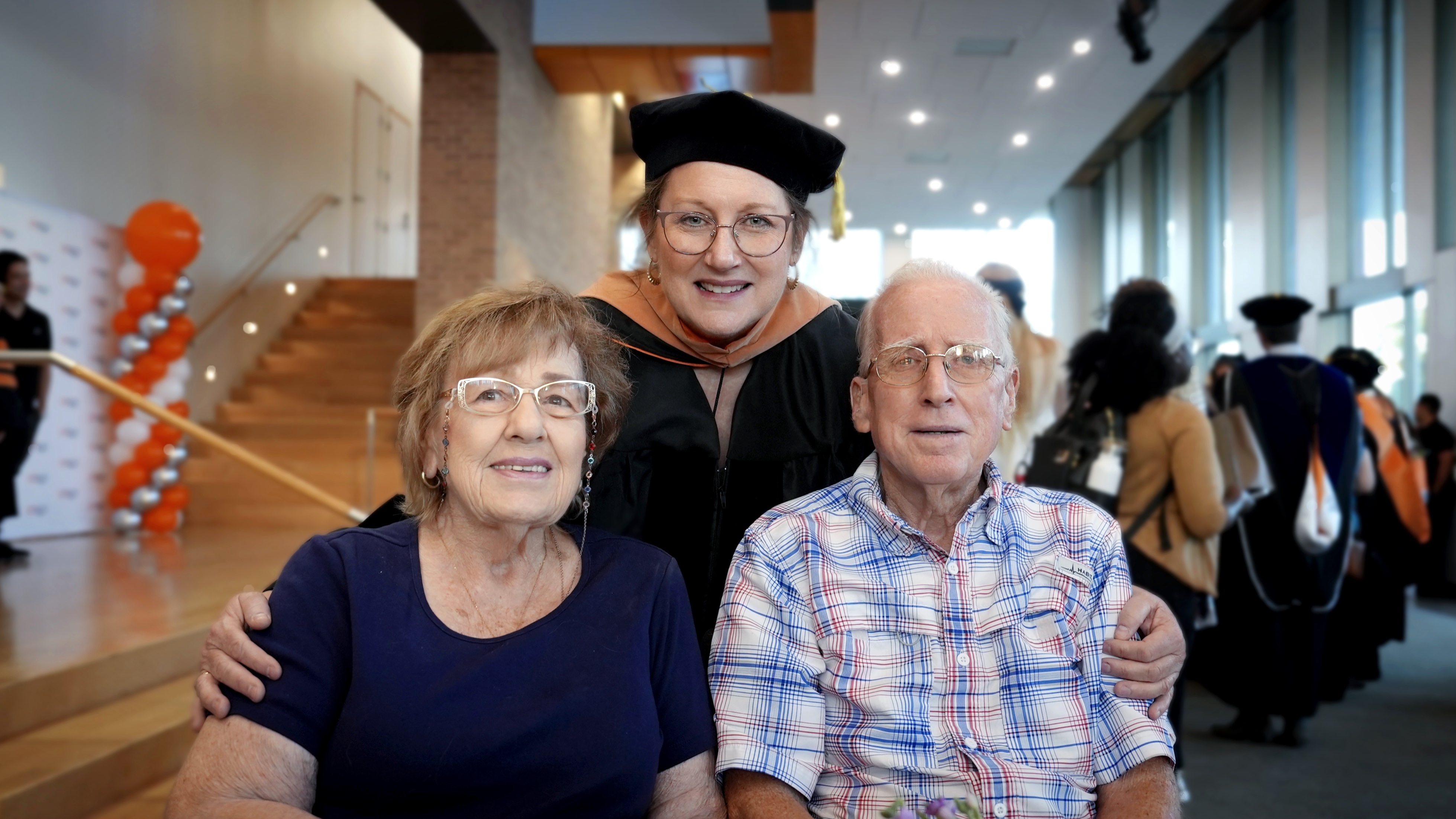 Joy Cain and parents