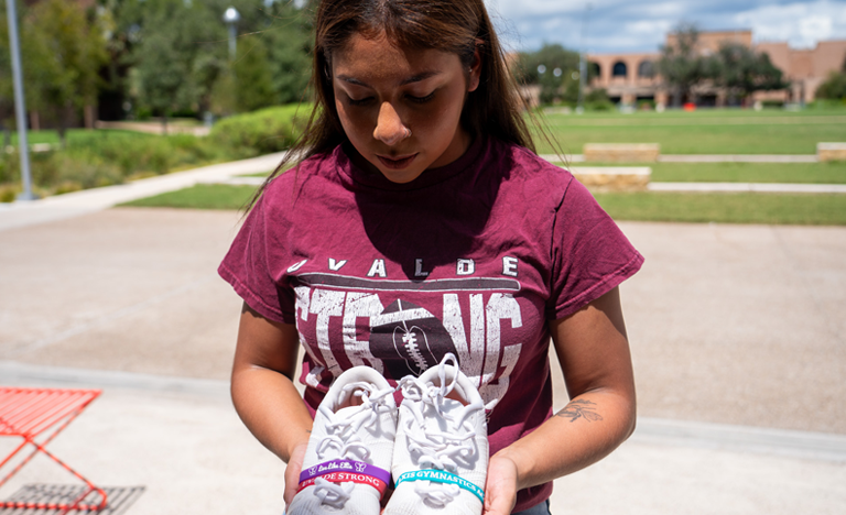 UTRGV cheerleader Madi Velasquez now honors her hometown every time she performs UTRGV cheerleader Madi Velasquez now honors her hometown every time she performs