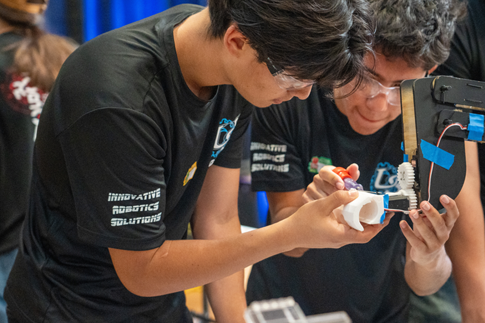students working on their robot