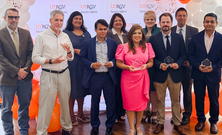 Faculty Impact Award recipients pose for a group photo ...
