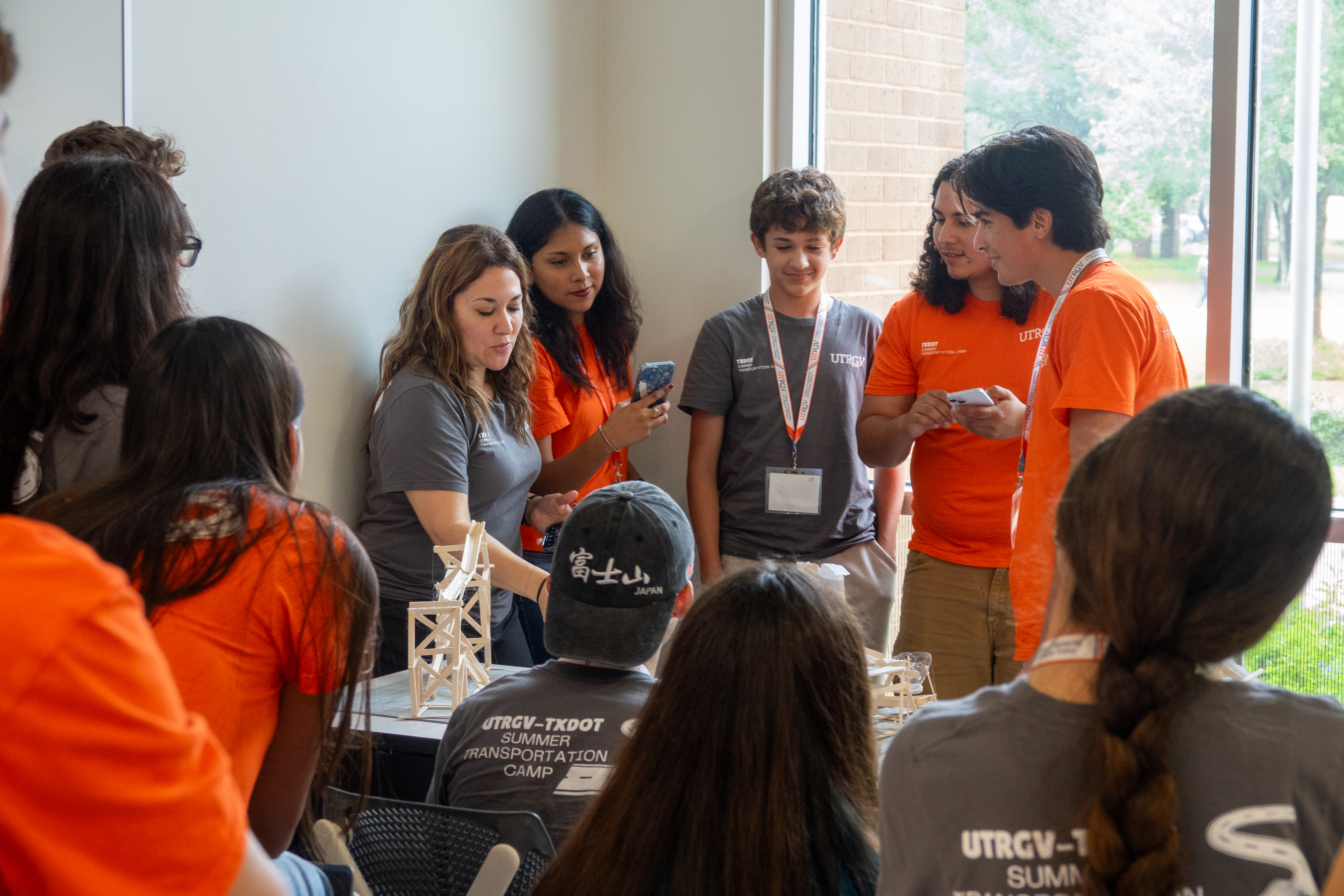 Presenter speaking to group of students