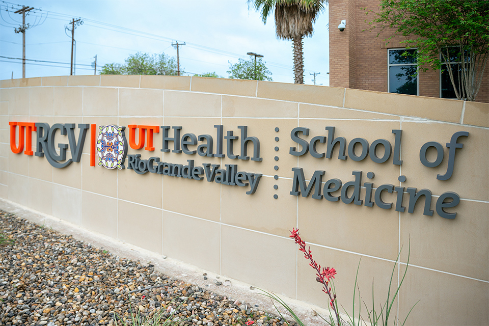 UTRGV and UT Health Rio Grande Valley School of Medicine signage outside the Edinburg campus building.