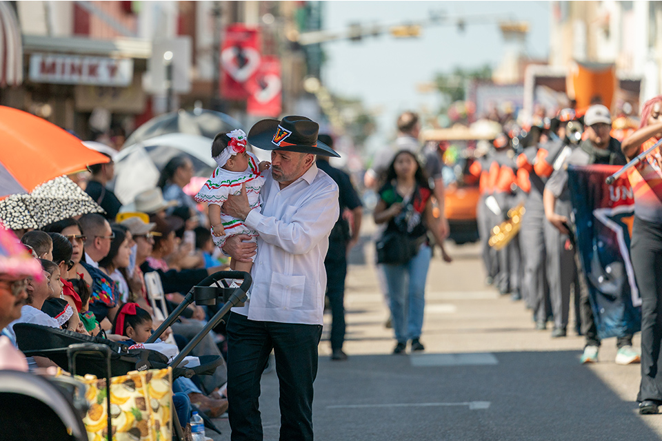 UTRGV President Guy Bailey participates in the International Parade during Charro Days in Brownsville.