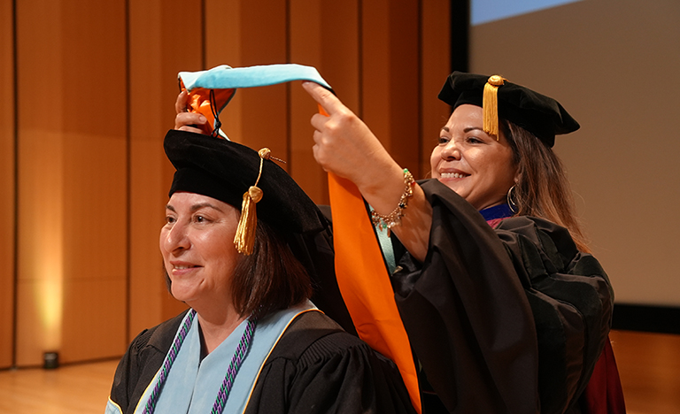 Spring 2024 doctoral candidate Dalila Ochoa is hooded by ...
