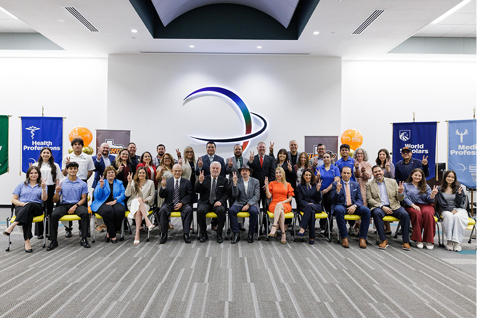 UTRGV and STISD administration and students from the district pose for a group photo.