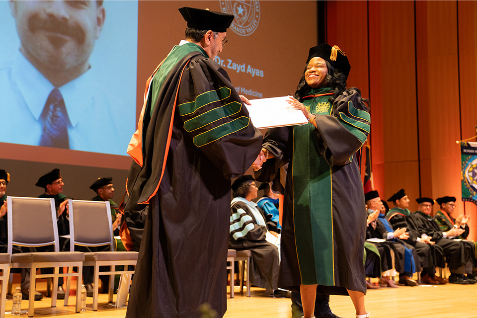 UTRGV School of Medicine graduate receives her degree from the dean on May 9, 2026.