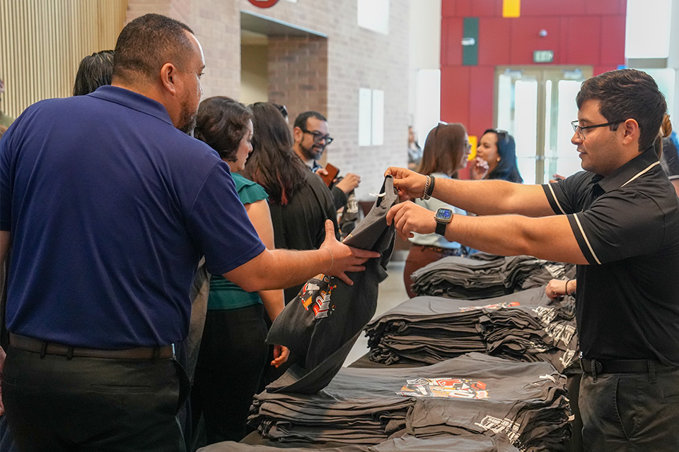 A t-shirt giveaway took place during Fall 2025 convocation.