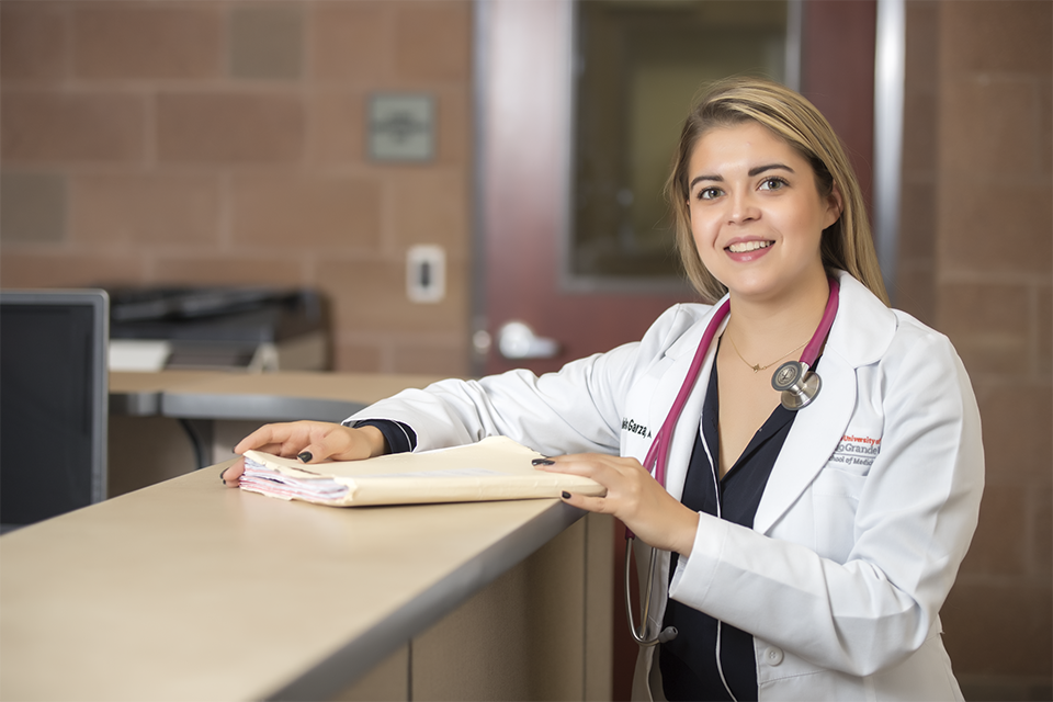 Daniela Garza, a graduate of the UTRGV College of Health Professions’ Physician Assistant program, has been working with UT Health RGV and the School of Medicine at the university’s four drive-thru COVID-19 testing sites, one each in Edinburg, Mercedes, Harlingen and Brownsville. (UTRGV Photo by Jenny Galindo)