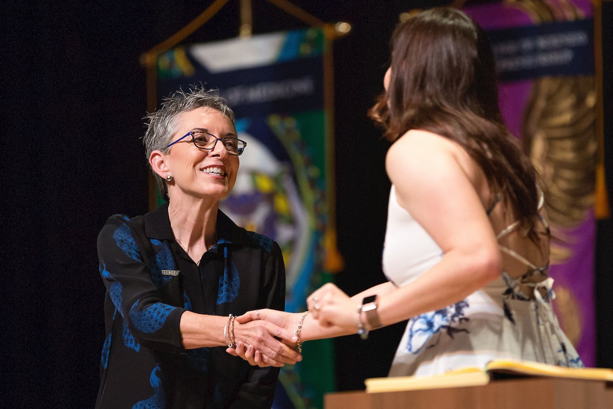 Dr. Patricia McHatton congratulates a student during the UTRGV Ring Ceremony.