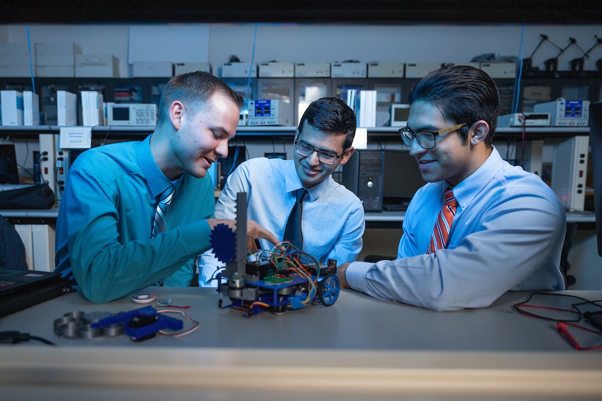 Thumbnail: UTRGV students Samuel Roberts, Joshua Acosta, and Salvador Garza with the robot they built for the IEEE Region 5 Robotics Competition.
