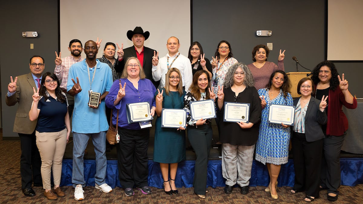 Student Supervisor Awards recipients posing with V's up.