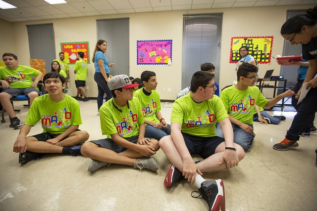 Team Mario summer camp students pay attention to thier instructor.