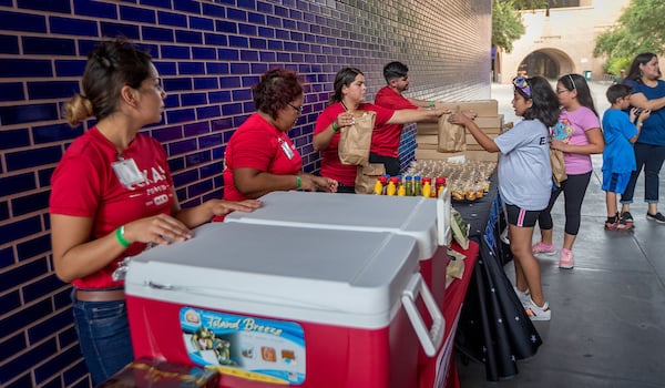 Thumbnail: H-E-B was also in attendance, offering free hot dogs, chips, snacks and drinks to those in attendance.