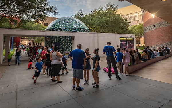 UTRGV H-E-B Planetarium attendees wait in line.