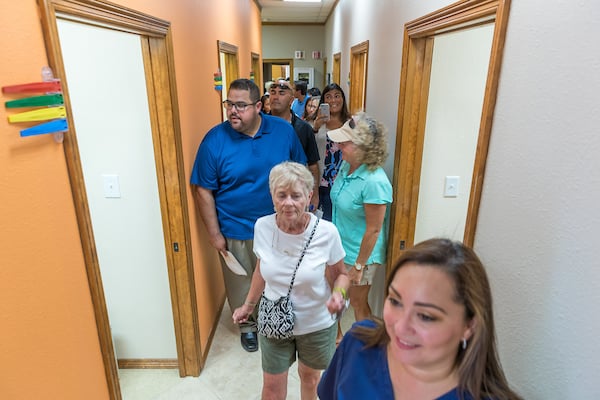 Guest recieve a tour of the Laguna Vista Clinic Ribbon.