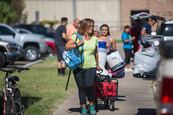 Parents of freshman also help on move-in day.