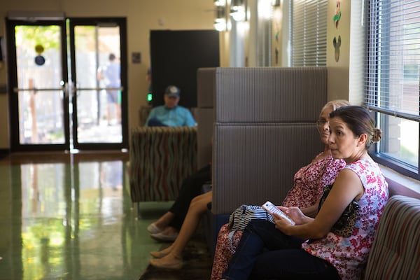 Parents and relatives wait for students to check-in.