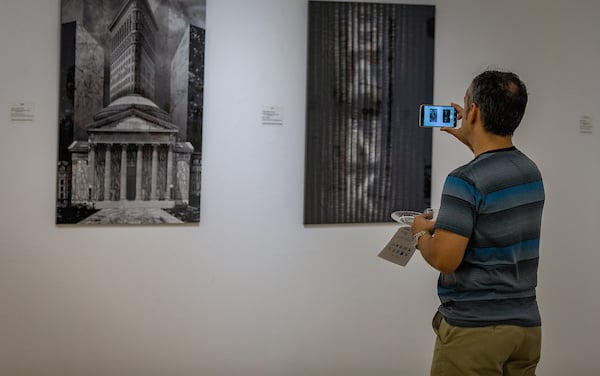 Visitor snaps a photo with his smart phone.