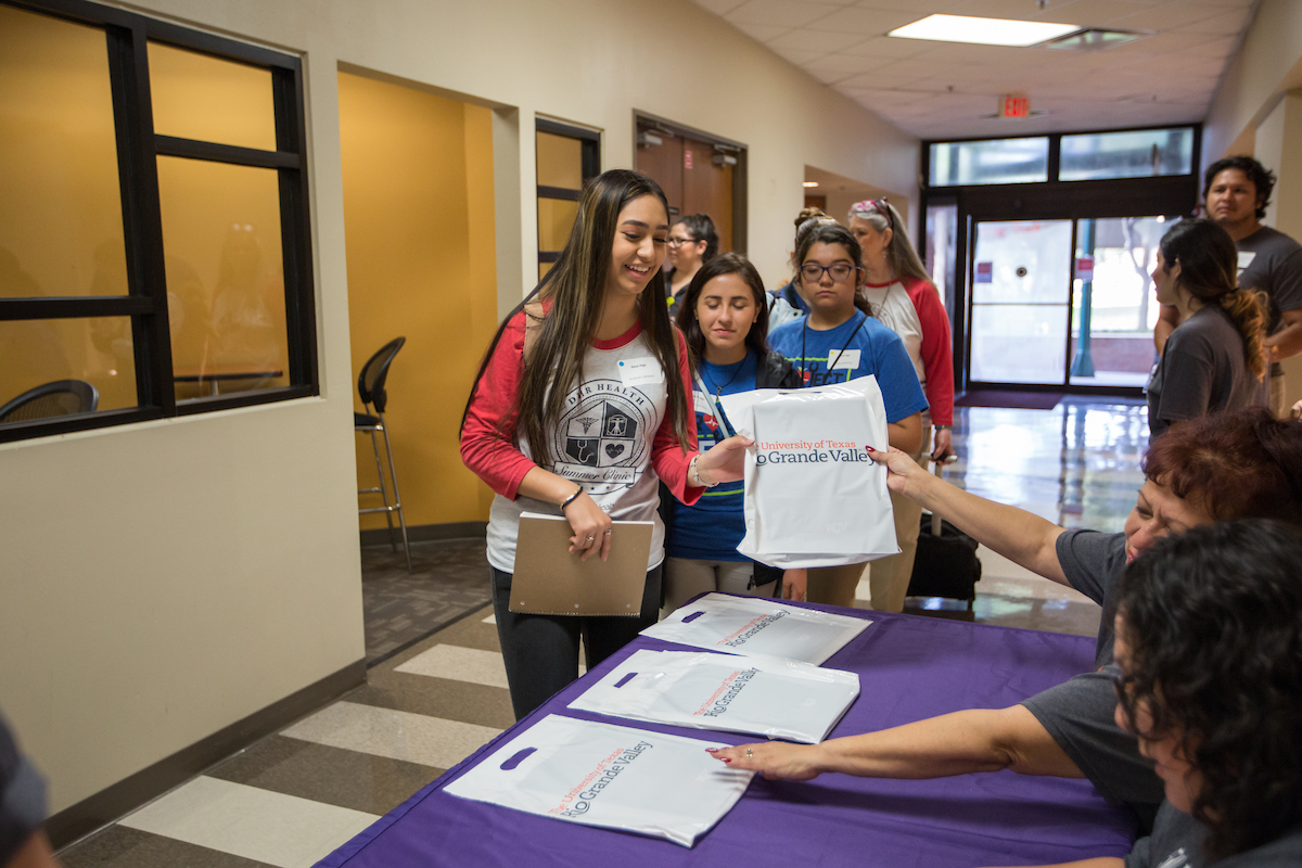 Students receive event packages.