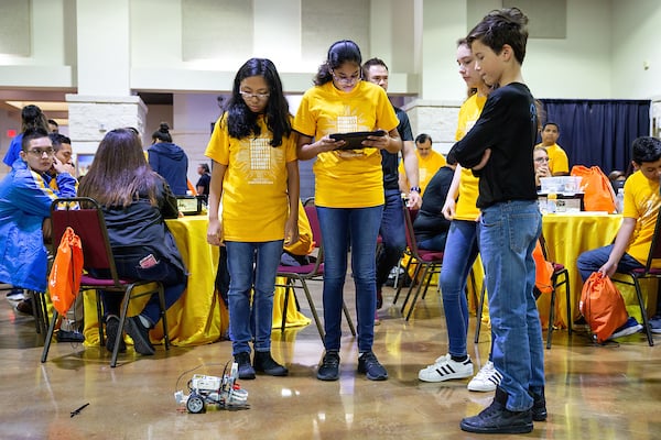 Students test their robots before the competition.