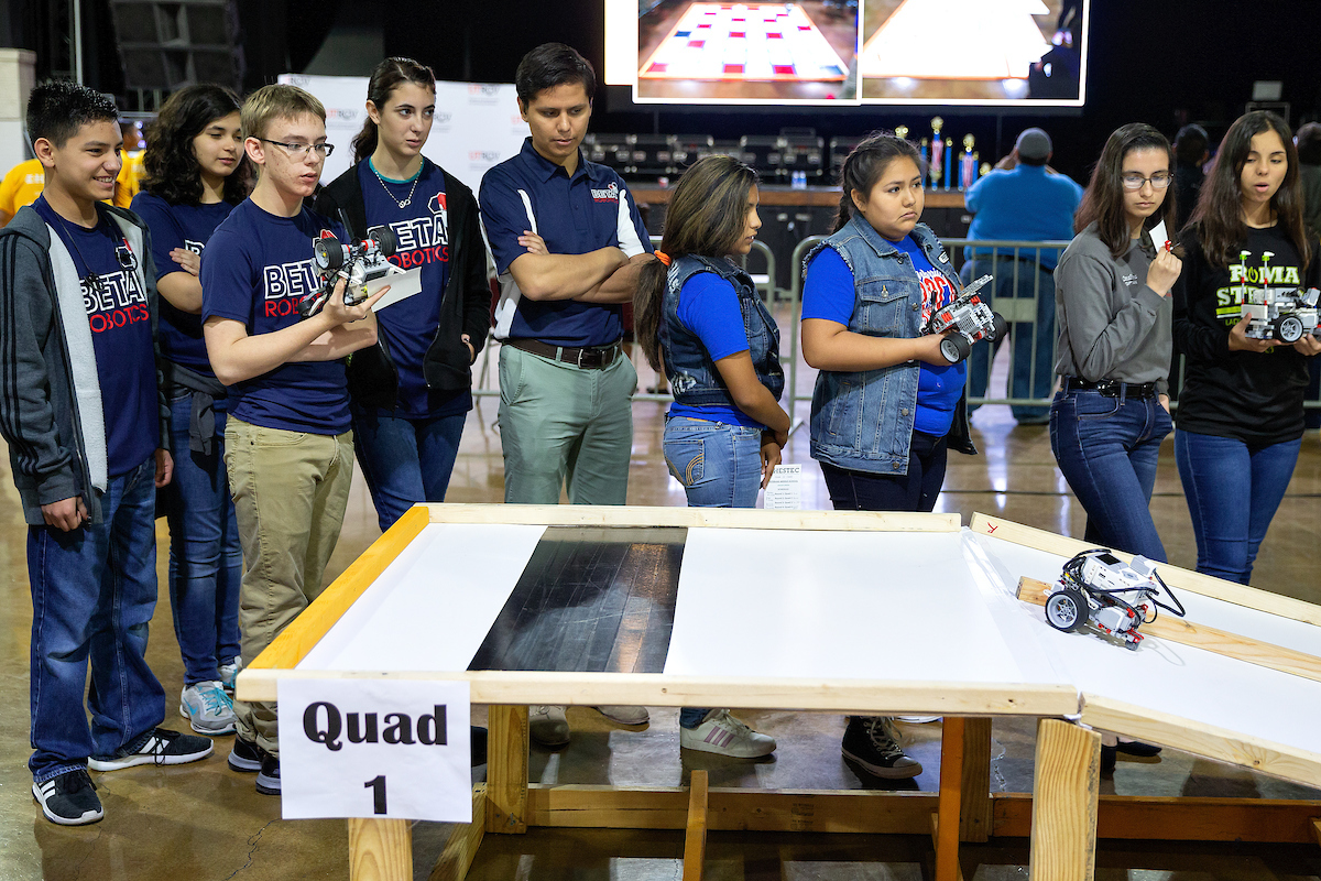 Team member starts her robot.