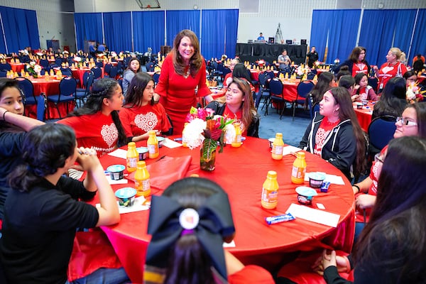 UTRGV Vice President Veronica Gonzales greets students.