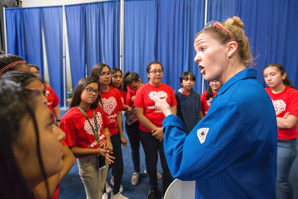 Kate the Chemist talks to students.