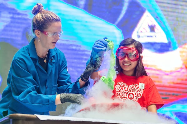 A student assists Kate the Chemist.