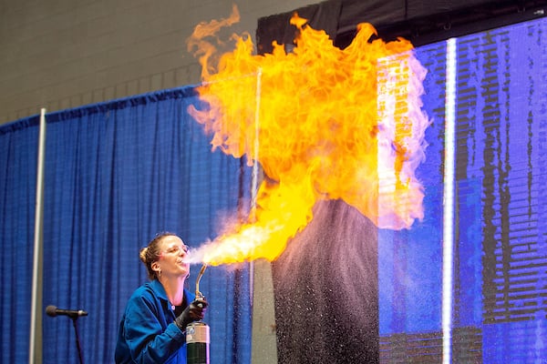 Kate the Chemist does a fire breathing demonstration.