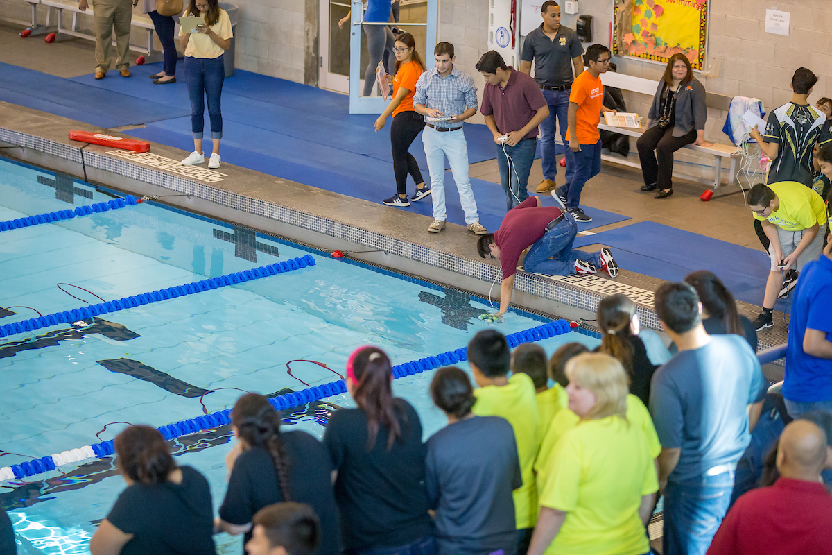 Audience watches the SeaPerch Challenge participants.