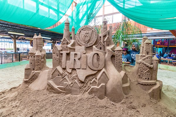 TRiO sandcastle at the Schlitterbahn entrance created by Sandy Feet