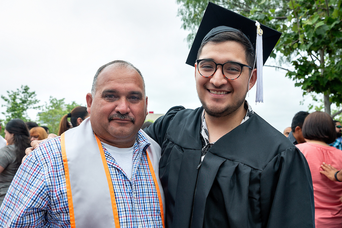 Francisco Perez with his son, also named Francisco Perez, at the UTRGV 9am Spring Commencement for the College of Fine Arts and the College of Liberal Arts on Saturday, May 11, 2019 at the McAllen Convention Center in McAllen, Texas.  UTRGV Photo by 