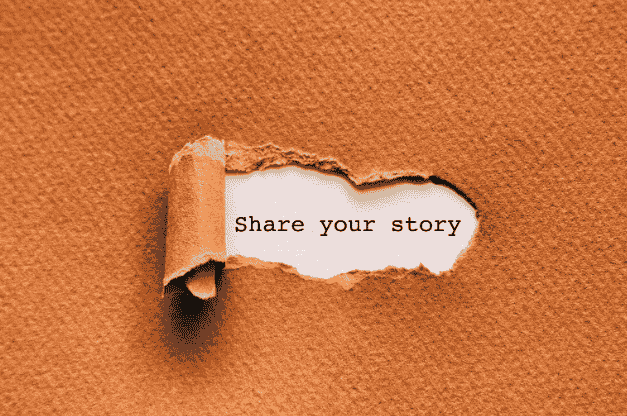 A piece of paper with a torn opening revealing a message underneath