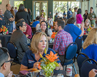 Conference filled with guests.