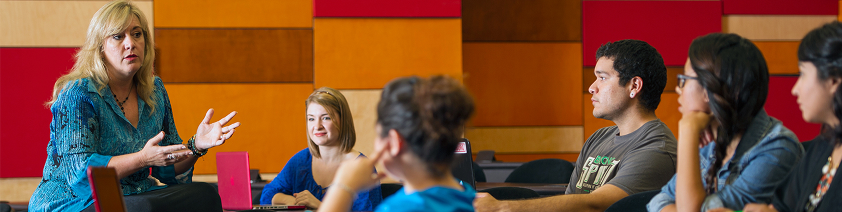 Instructor having a class discussion with students.