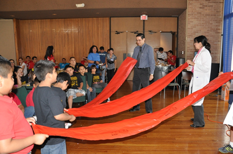 students participate in a PREM outreach activity