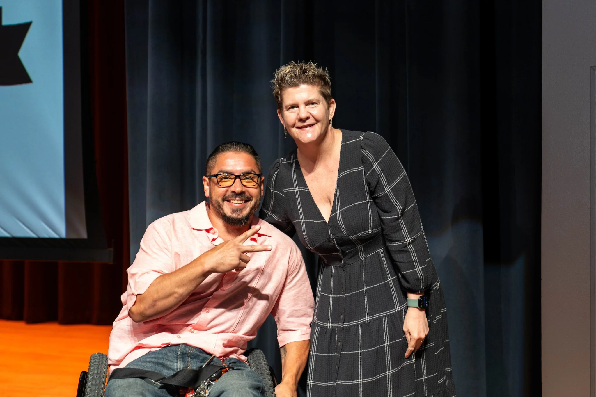 Two UTRGV employees pose together at an employee service recognition event.