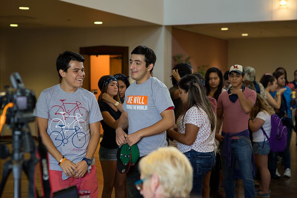 UTRGV students wait in line to have their photo taken during Picnic With the President on Thursday, Sep. 3, 2015 at El Gran Salon in Brownsville, Texas. UTRGV photo by Paul Chouy