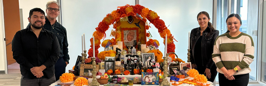 PhD in Clinical Psychology Diversity Committee Dia de los Muertos group photo with altar