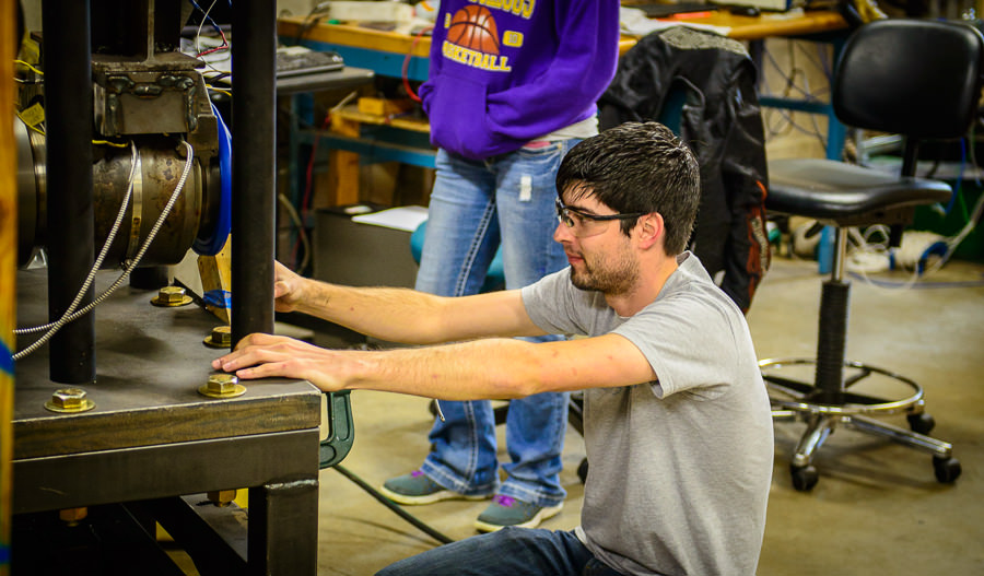 Student working on mechanical project