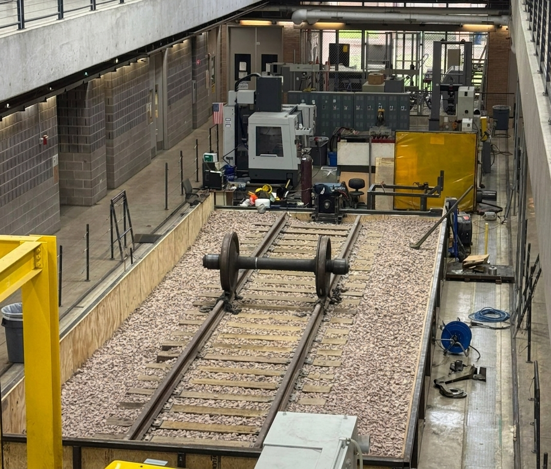 UTRGV test facility showing embedded rail section and laboratory equipment