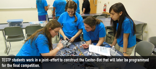 TESTP students work in a joint-effort to construct the Castor-Bot that will later be programmed for the final competition.