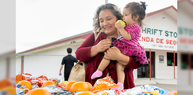 A mother and her baby at a community event