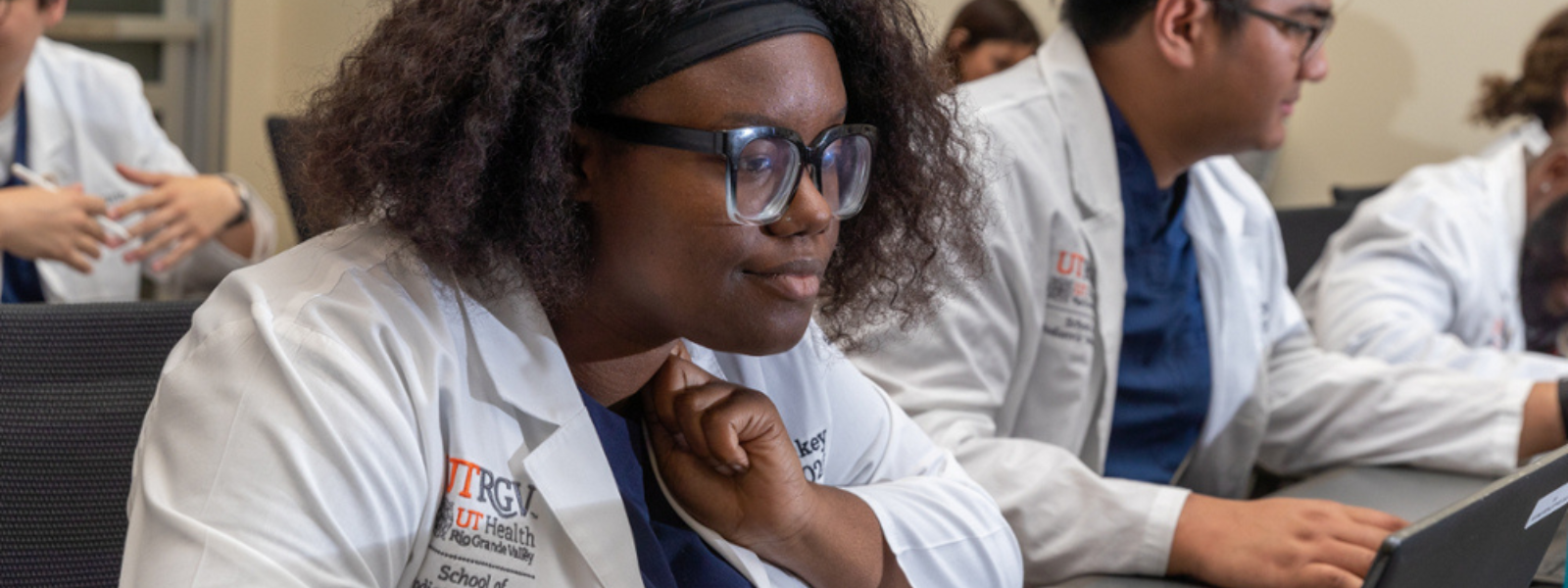 Student working on laptop.