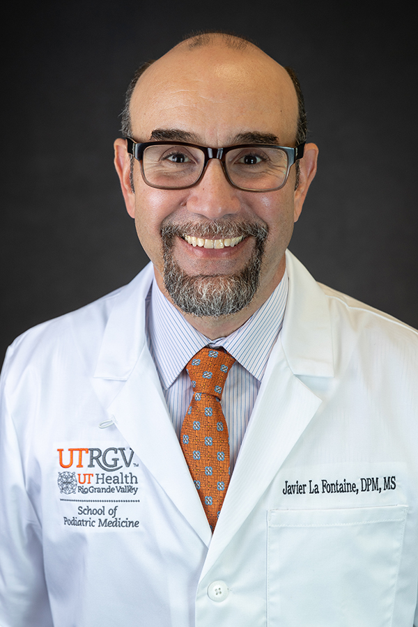 Smiling portrait of SOPM dean.