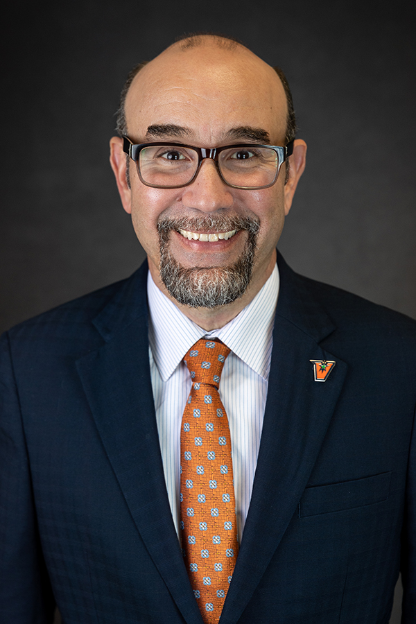 Smiling, dean portrait.