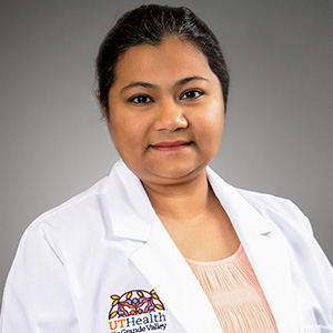 Smiling, faculty portrait.